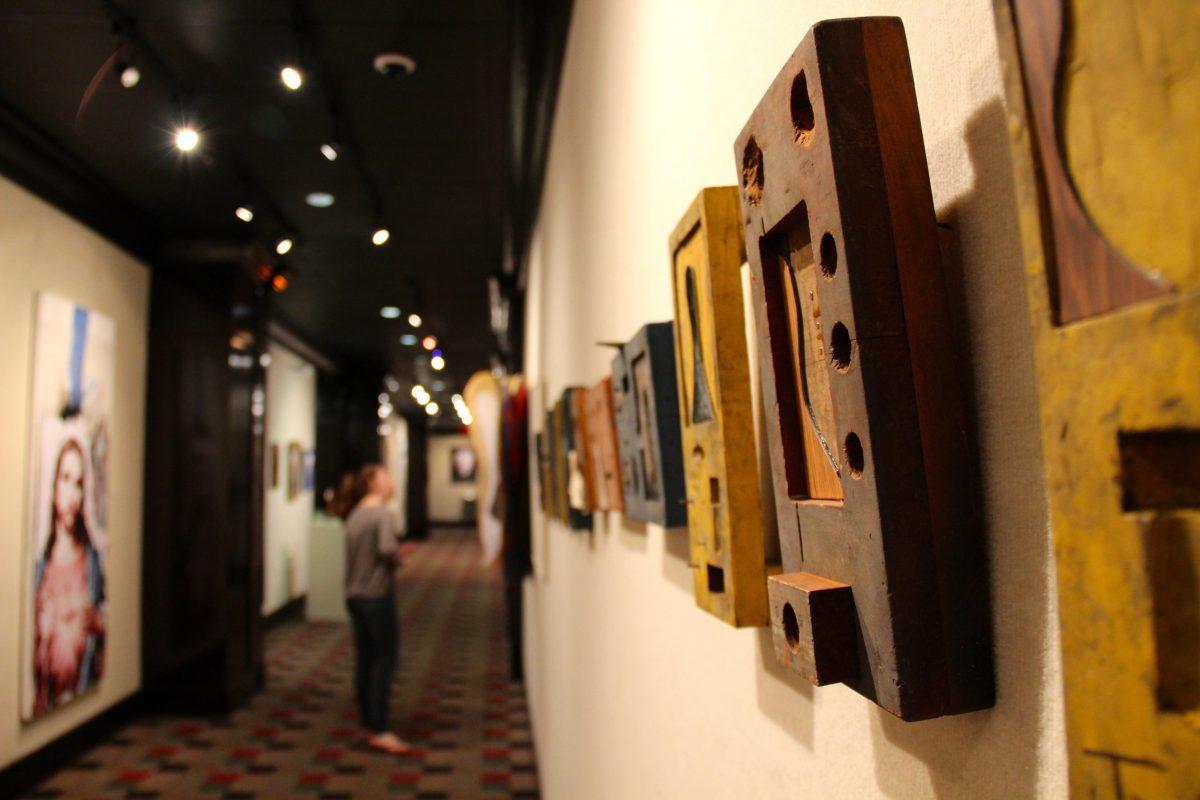 The Chapman Culture Gallery’s long and narrow hallway is not conducive to the symmetry in Neely’s exhibit. Each piece is in tension with the others.