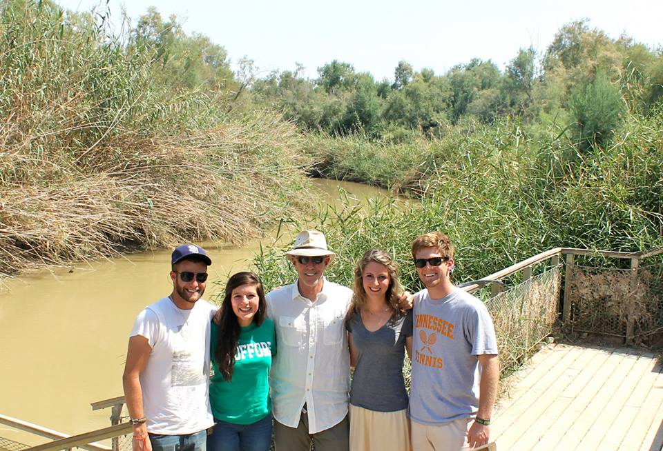 Every summer McCane leads a team of Wofford students on trip to Israel where they participate in an archaeological dig. Here he stands, middle, with the team from summer 2013 at the Jordan River.