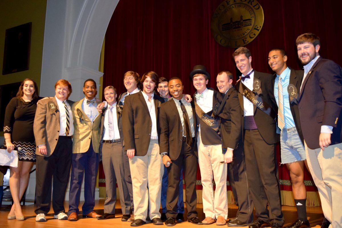 The Mr. Wofford contestants, along with Emcees Donya Amer and Donovan Hicks, line up for a final shoot after the pageant.
