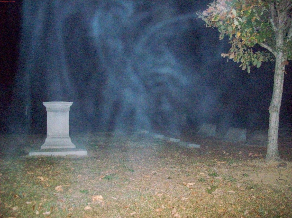Photo taken of a mysterious moving fog that appeared around the graves at Oakwood Cemetery, just off E. Main Street.