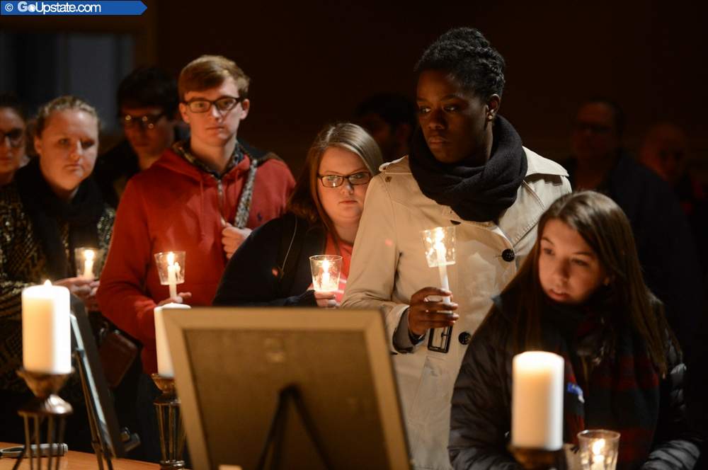 Wofford’s Muslim Students Association held a candlelight vigil for the three Muslims  killed in North Carolina on Feb. 10. Image courtesy of GoUpstate.com.