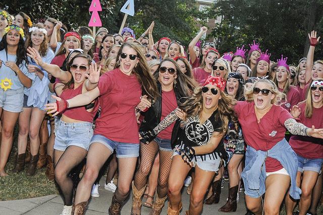 After the conclusion of 2015’s recruitment process, Caroline Starnes (left) runs to greet a new member of Zeta Tau Alpha outside of Anna Todd Wofford on Bid Day. 