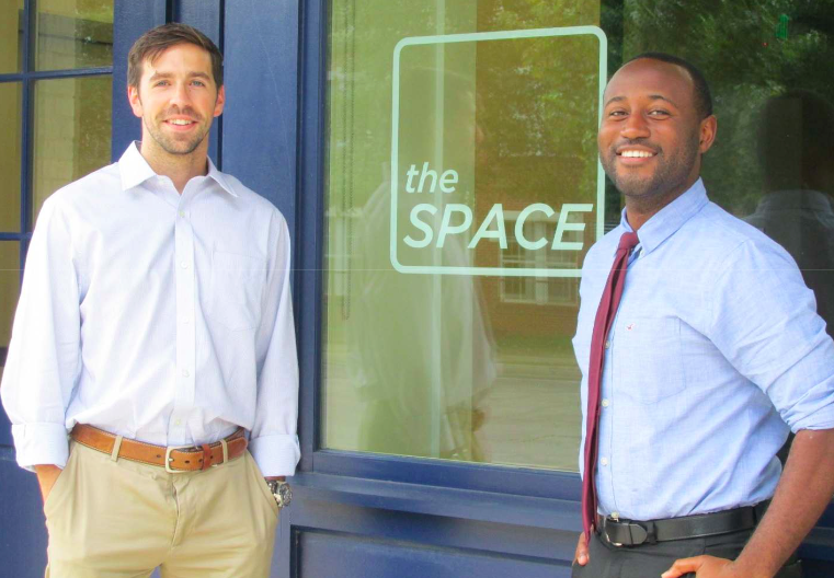 From left, Tyler Senecal and Lee Smith pose in front of The Space, which is open to all students at all hours. 