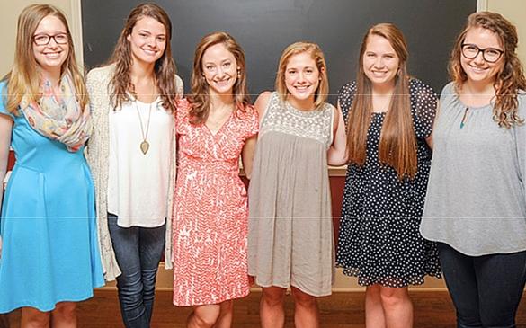From Left to Right: Kirsten Frost, Zoe Paist, Anna Henson Maggie Stroud, Margaret Carraway and Taylor Brown are among the seven alumni assigned to serve subjects ranging from mathematics to social studies.  
