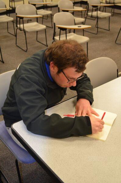Senior Kevin Emery maps out his assignments and other responsibilities to fight senioritis.  