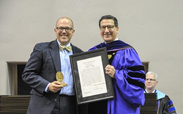 President Samhat awards McPhail with his second Algernon Sydney Sullivan Award in May 2014. This award is presented to community members who embody “service over self,” and McPhail was also a recipient as a graduating senior in 1996.