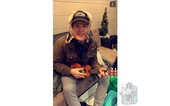 Kevin Quis poses with a ukulele sent from an anonymous Snapchat account. A bright future encouraged by the Space program at Wofford College or a false trail? 