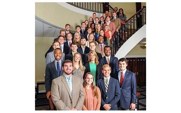 The 2015-2016 Campus Union Assembly, of which Chris Paschal, Chie Mushayamunda, Brendan Paschal and Drake McCormick all took part, smiles for an official group photo. 