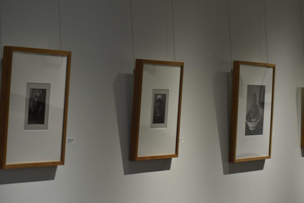 Frazier’s photos line the wall of her exhibition.