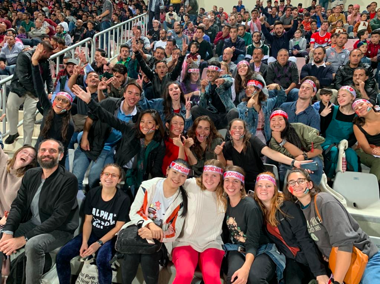 Sadie Fink (far left, first row) with fellow students at a Jordanian soccer game