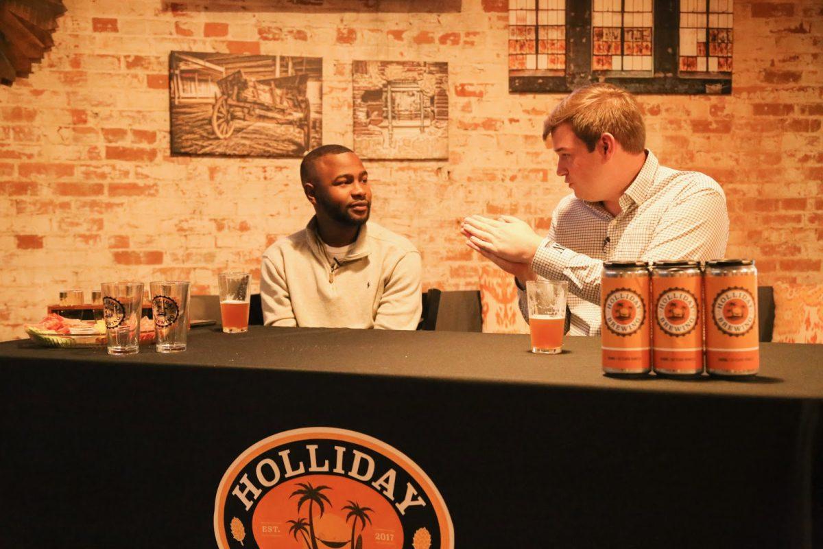 Bryant and McCall enjoy a beer at Holliday Brewing Company on an episode of Carolina Roll Call. The podcast aims to encourage bipartisan discourse and works to humanize local, South Carolina politicians.