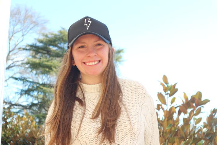 Emma King ‘22 with a Happy Trucker hat.