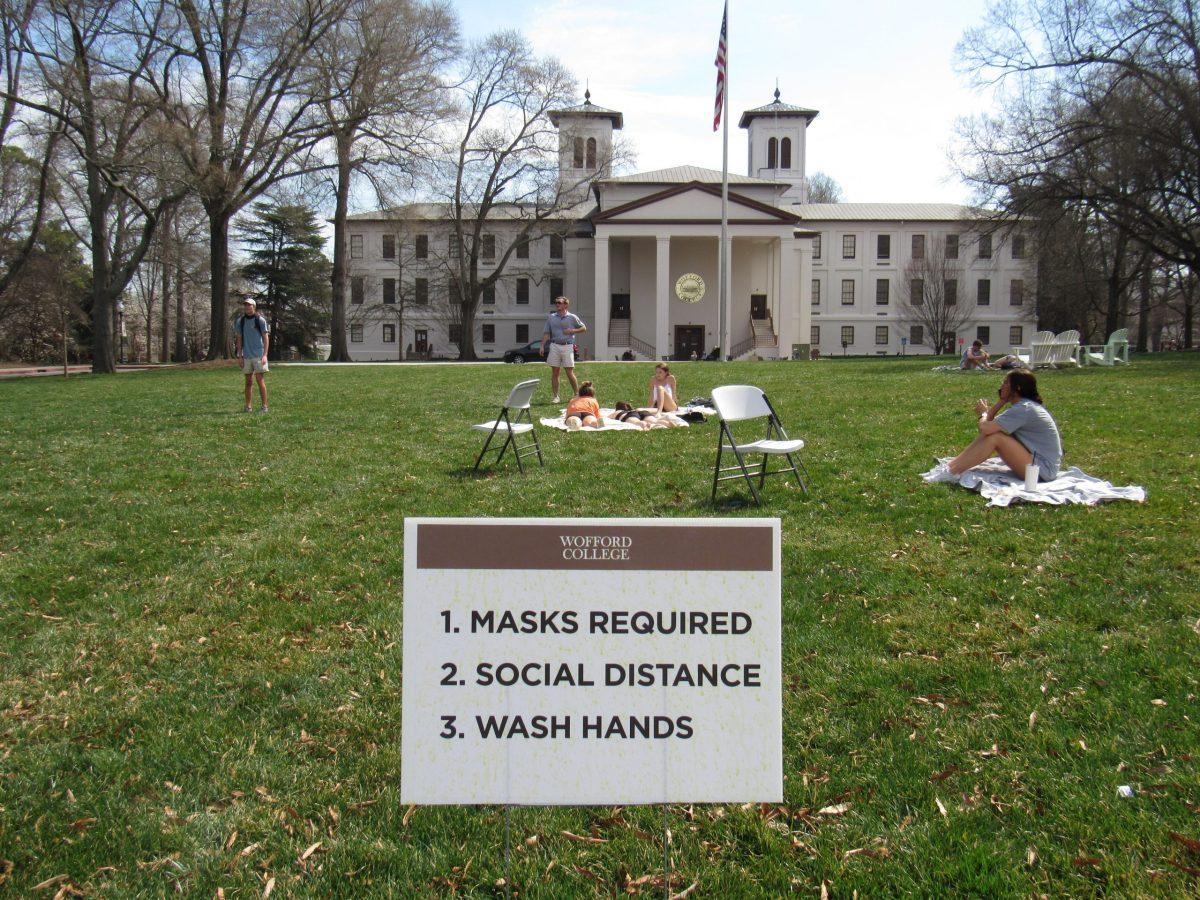 Pictured+is+a+sign+that+Wofford+has+put+up+to+explain+COVID+precautions.+These+signs+are+all+around+campus+to+remind+students+of+the+rules+and+regulations.+Photo+courtesy+of+Natalie+Aversano.