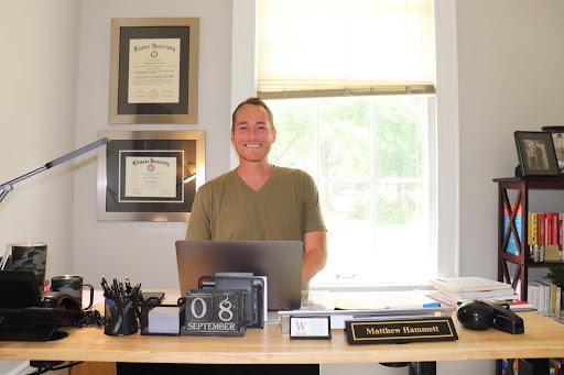 Hammett in the Title IX office, located in the Snyder House. He will be serving as the new Title IX Coordinator. Photo courtesy of Anna Lee Hoffman.