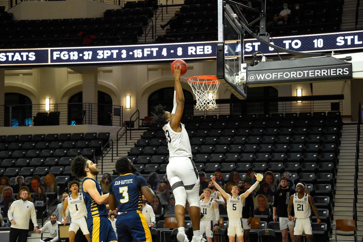 BJ Mack rises up for a dunk against UTC. Mack hopes to improve upon a stellar debut season where he averaged 6.8 points and 3.3 rebounds per game with 5 starts. Photo courtesy of Mark Olencki.