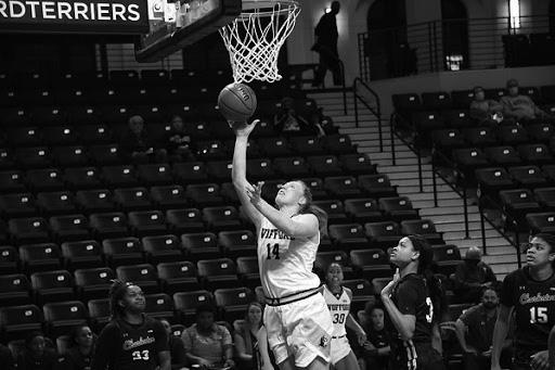 Photo courtesy of Mark Olencki.
Lily Hatton ‘23 led the women’s basketball team scoring with 12 points in their opening game against College of Charleston.