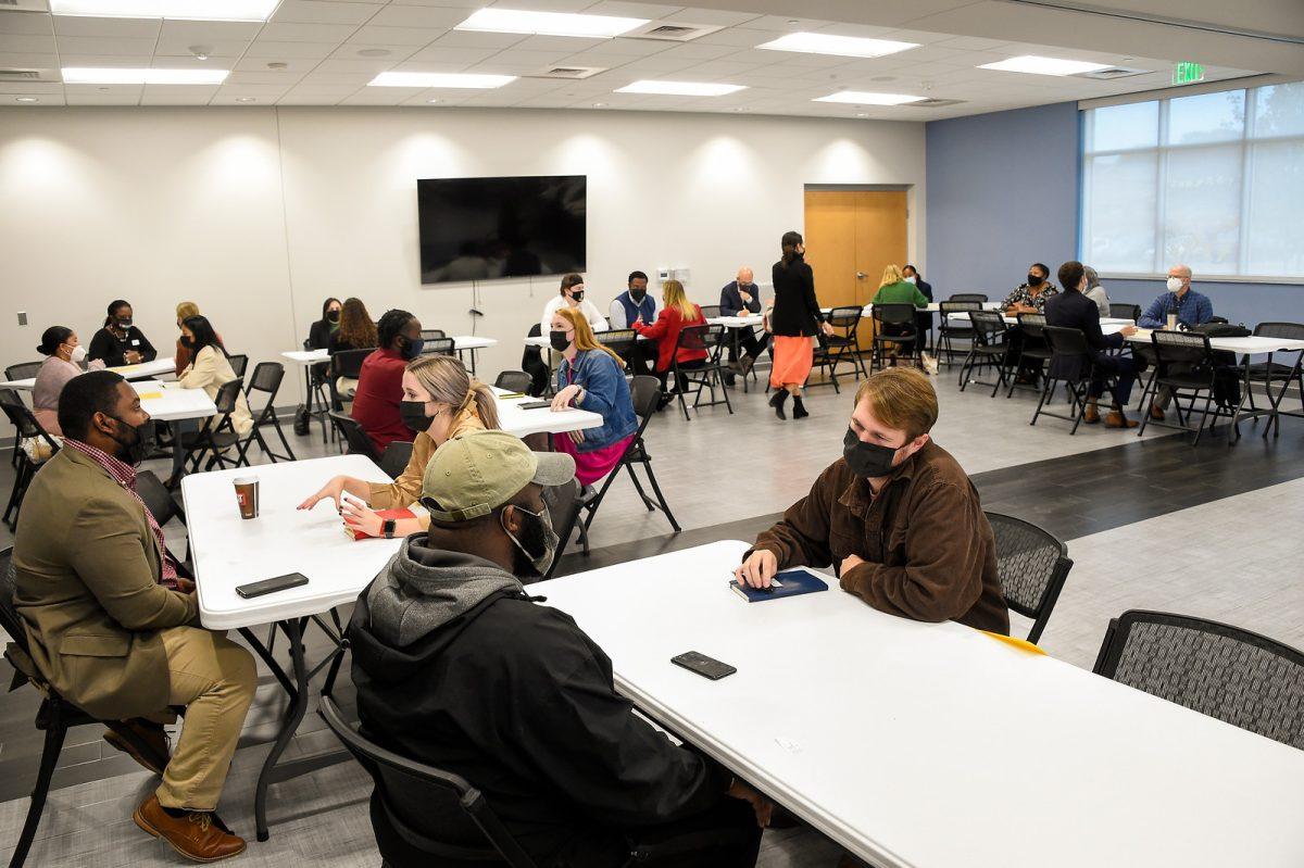 Photo courtesy of Mark Olencki.
Building Sustainable Communities class meeting with community partners. This course pushes students to engage in community-based learning in
Spartanburg, working to pop the Wofford bubble.