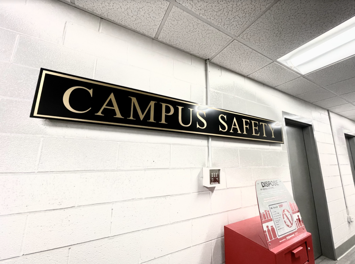 Photo by Anna Lee Hoffman. The campus safety sign inside the Mungo Student center. Students are encouraged to interact with staff on all events, including safety trainings and drills.