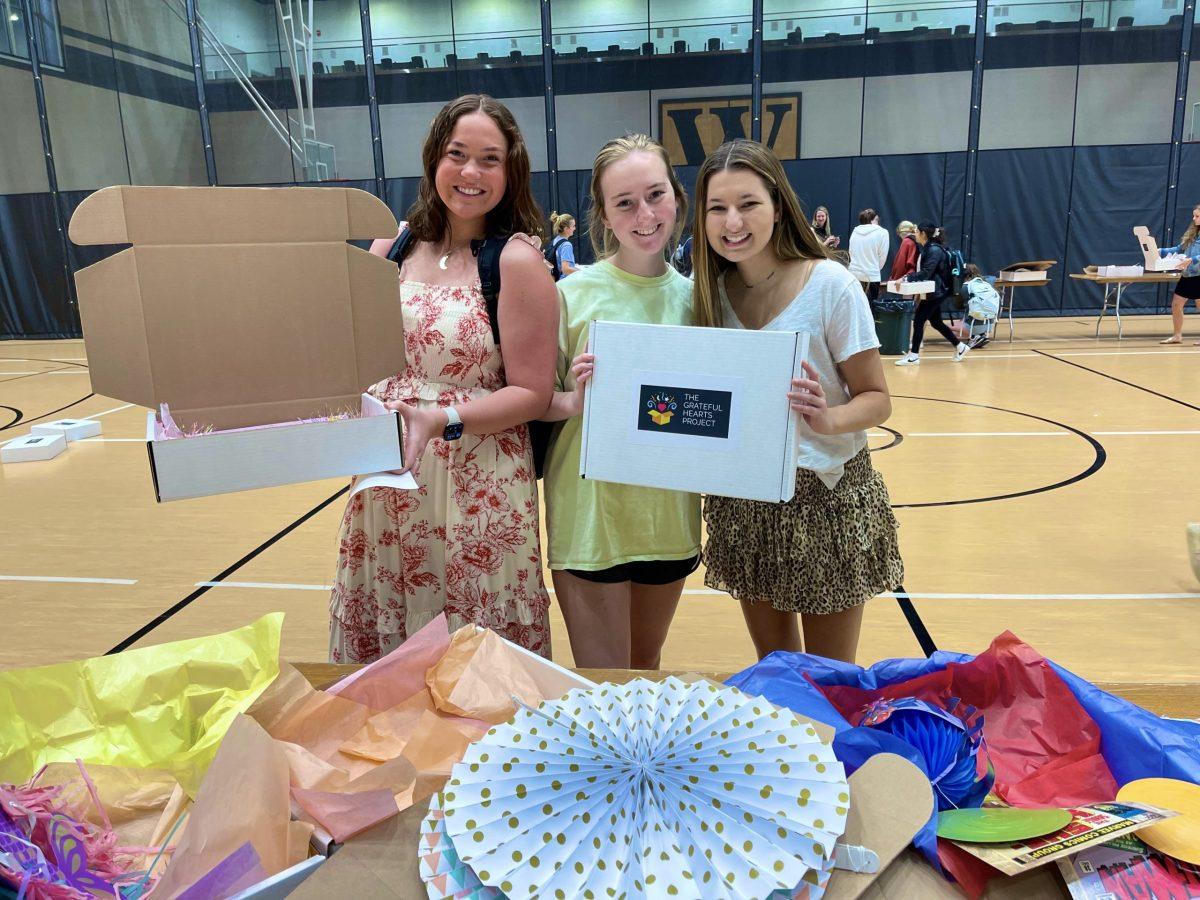Photo by Paulina Veremchuk.
On Thursday, Apr. 28, students put together boxes for Grateful Hearts in Benjamin Johnson Arena. A total of two hundred boxes were assembled.