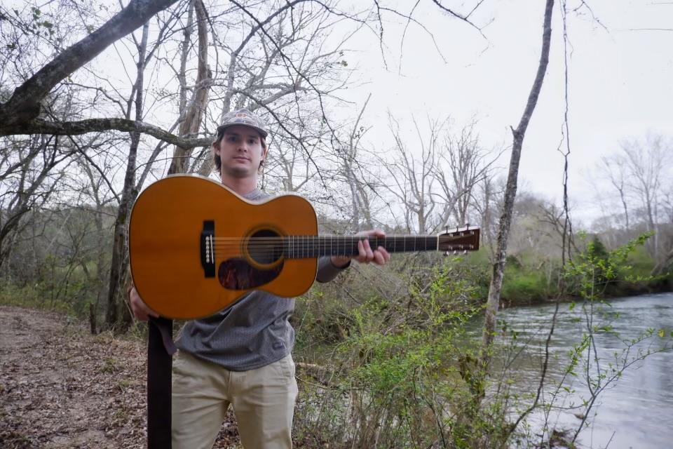 Photo courtesy of Thomas Rowland -
Rowland using his musical talent to promote his upcoming concert, opening for Old Crow Medicine Show on April 13.