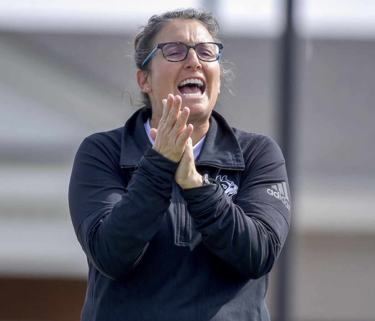 Photo courtesy of Mark Olencki -
Krissy Hall seen coaching the Wofford women’s tennis team and earning her
100th win. Hall reached her 100th win on Feb. 26, 2023 against Appalachian
State.