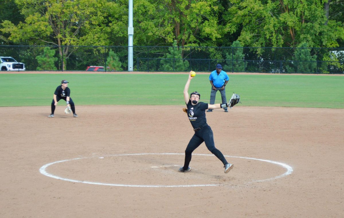 Pitcher for the Softball team, Margaret Axelson ‘26, pitches at Snyder Field in a scrimmage against USC Aiken.
