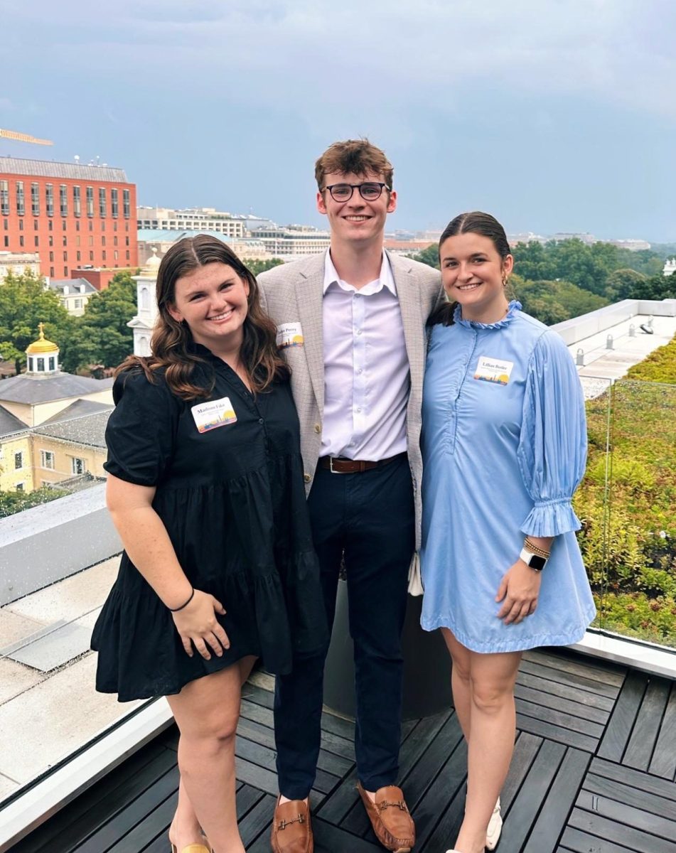 Students Madi Fike ‘24, Dalton Perry ‘25, and Lillian Butler ‘25, pose together at “Regan on the Roof,” a reception held at the Ronald Reagan Institute. Each summer Wofford students are given the opportunity to intern at Capitol Hill.