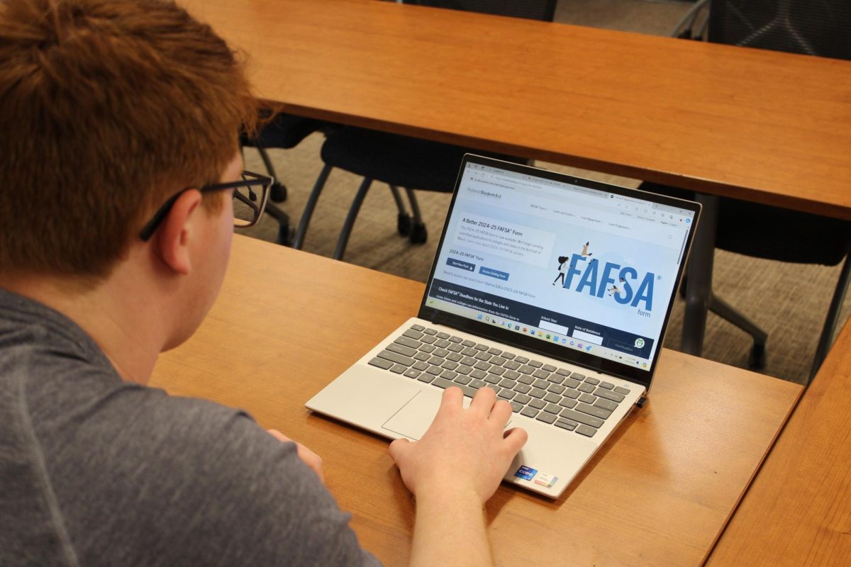 Quinton Stemler ‘26 fills out his FAFSA for the 2024-2025 school year. 