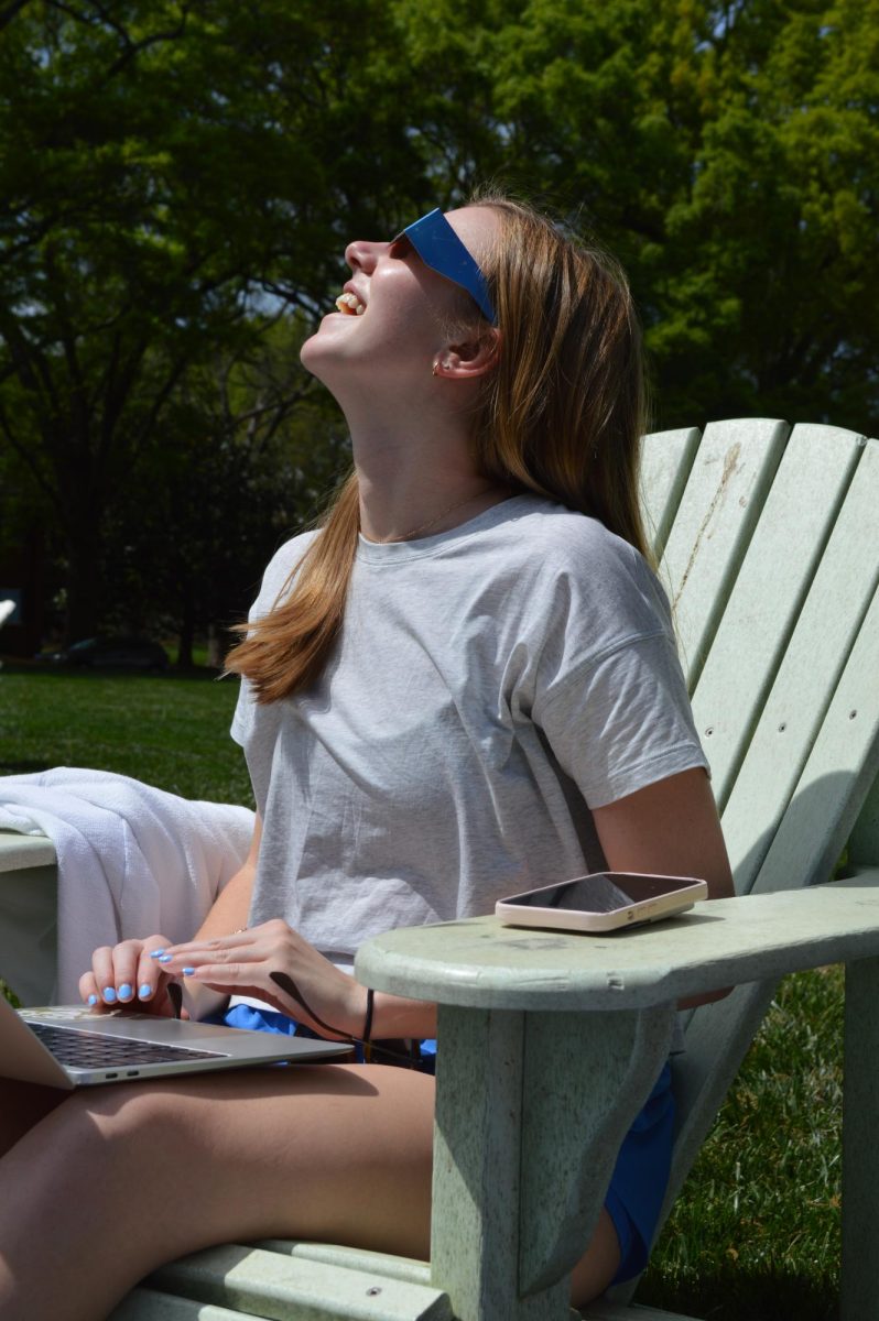 Bailey Herron ‘26 watched the Solar Eclipse in the Horseshoe. 
On April 15, 2024 the Solar Eclipse occurred, and students watched the event all throughout campus.
